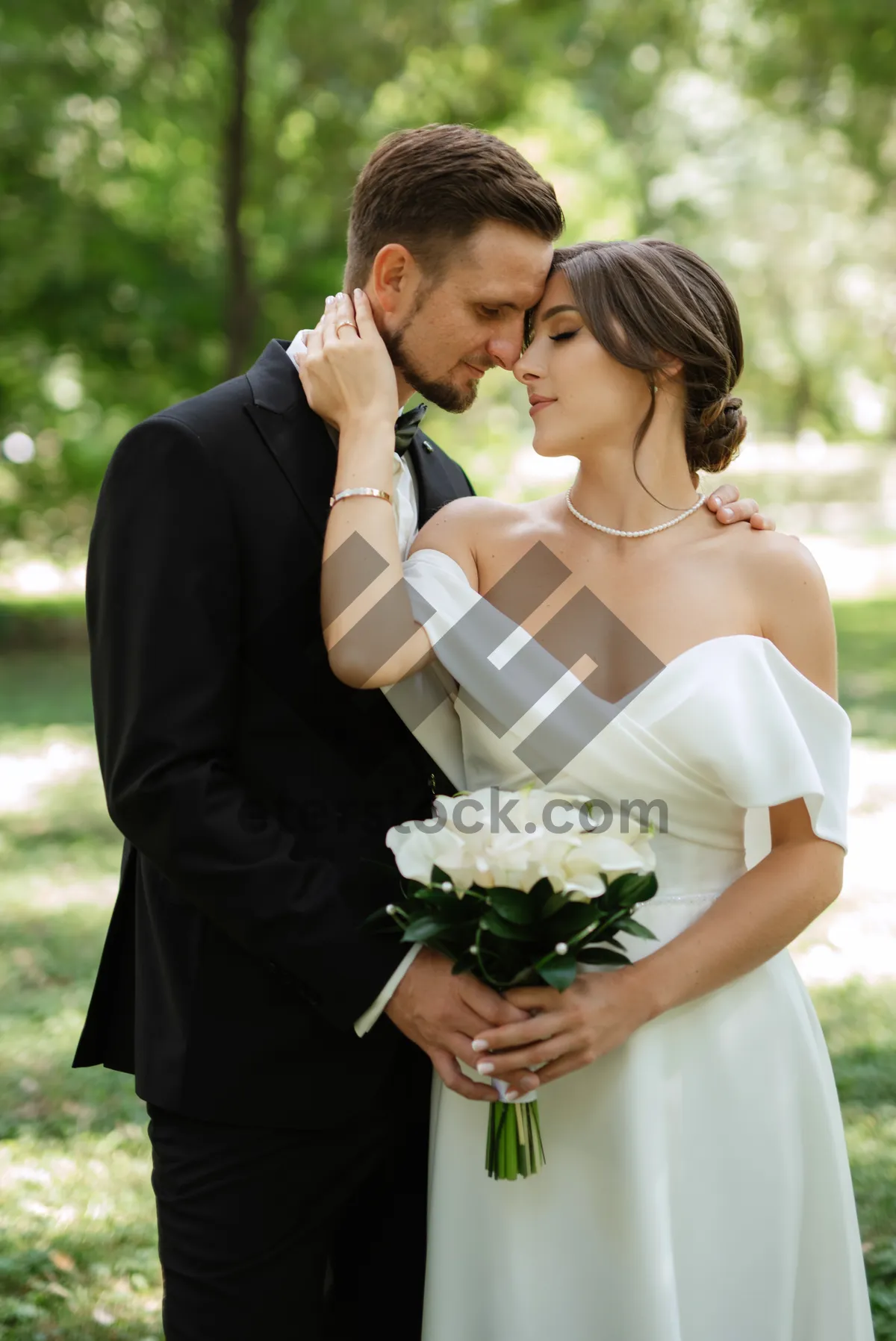 Picture of Happy Groom and Bride Celebrating Outdoors