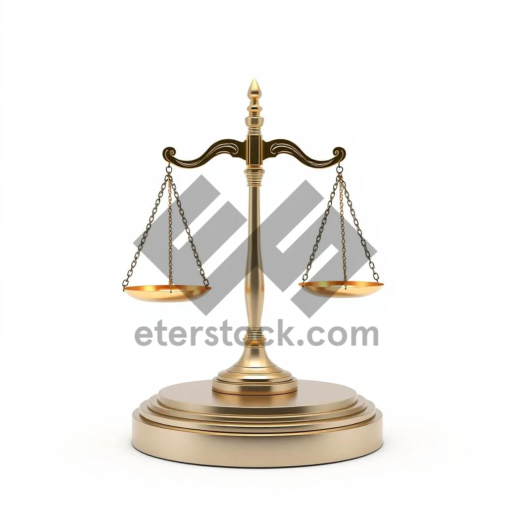 Picture of 3D scales of justice symbol in gold and bronze.