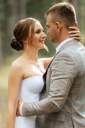 Happy couple outdoor wedding portrait romantic love bride groom.