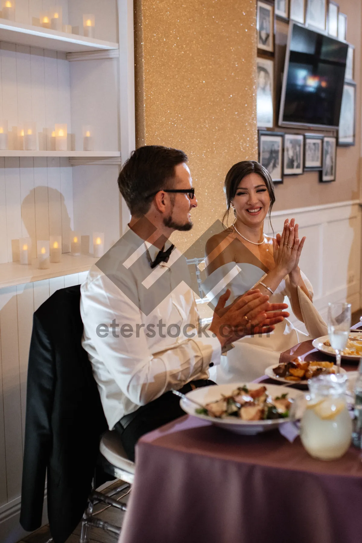 Picture of Happy couple enjoying a meal at the restaurant.