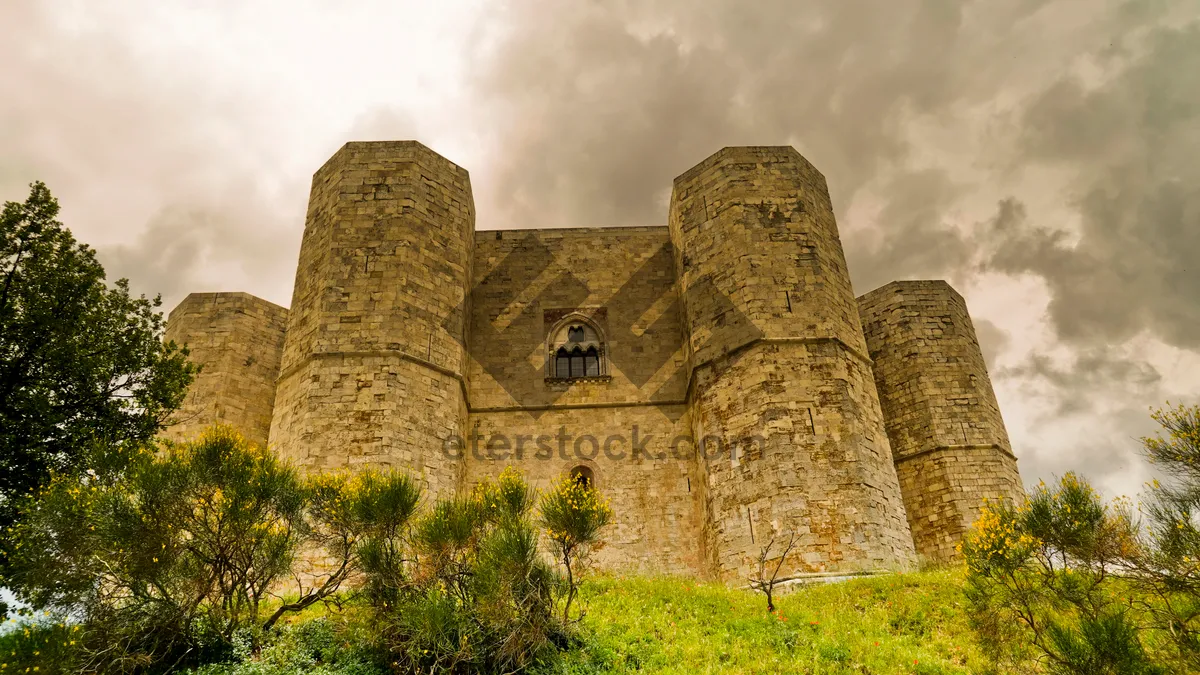 Picture of Medieval Castle Ruins against a Cloudy Sky