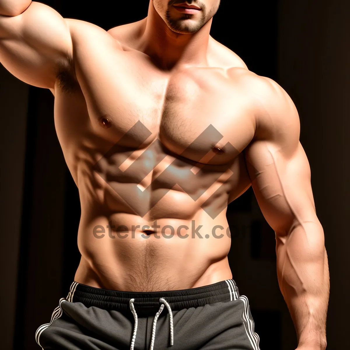 Picture of Muscular Male Model Posing Shirtless in Studio