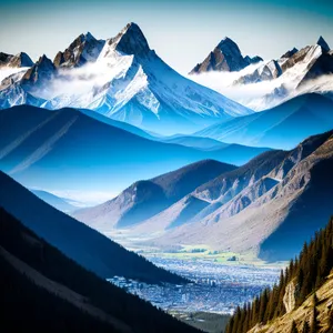 Majestic Winter Wonderland: Glacier-framed Mountain Range Reflections