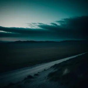 Golden Horizon over Desert Dunes