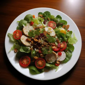 Gourmet salad with fresh vegetables and cheese plate