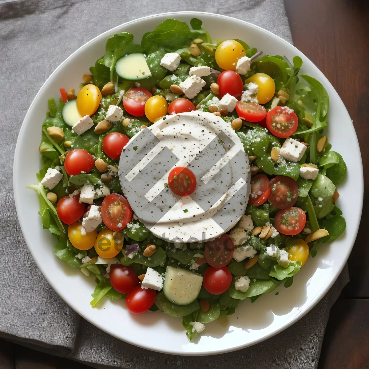 Picture of Fresh vegetable salad with berries and olives.