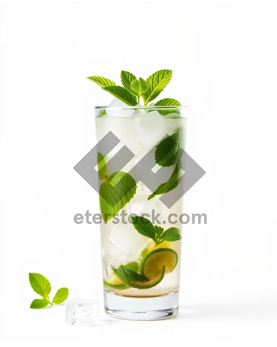 Picture of Fresh citrus cocktail in glass jar with ice and flowers