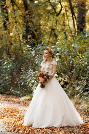 Smiling Bride and Groom Celebrate Wedding Outdoors