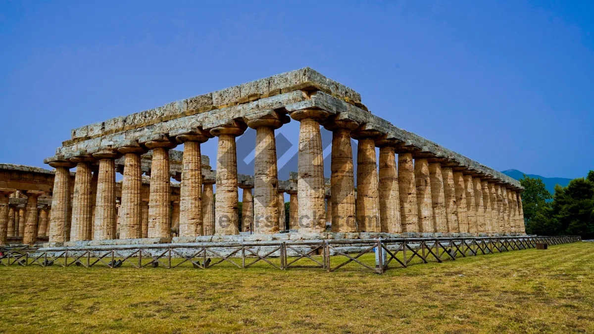 Picture of Ancient Roman Temple Columns in Historic City Skyline