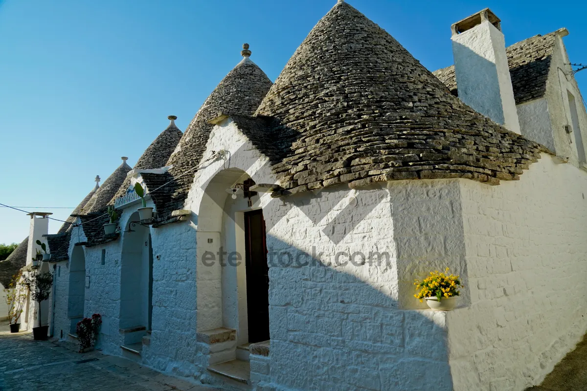 Picture of Ancient Stone Church Bell Tower: Historic Architecture.