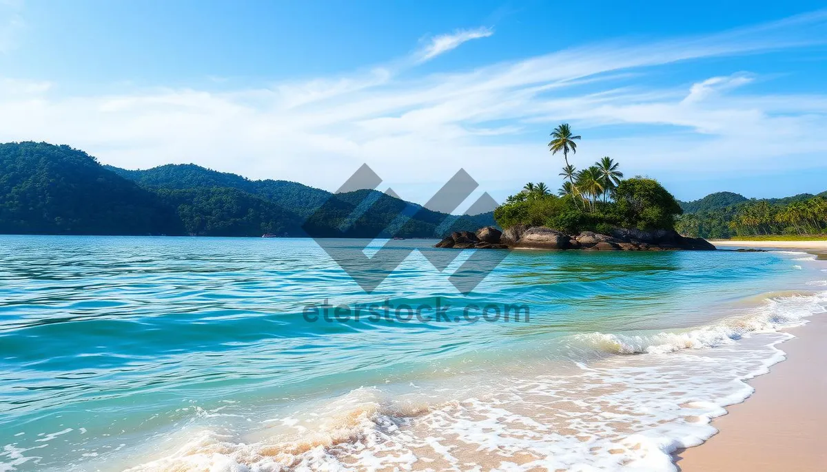 Picture of Tropical Sunset over Turquoise Sea on Beach.