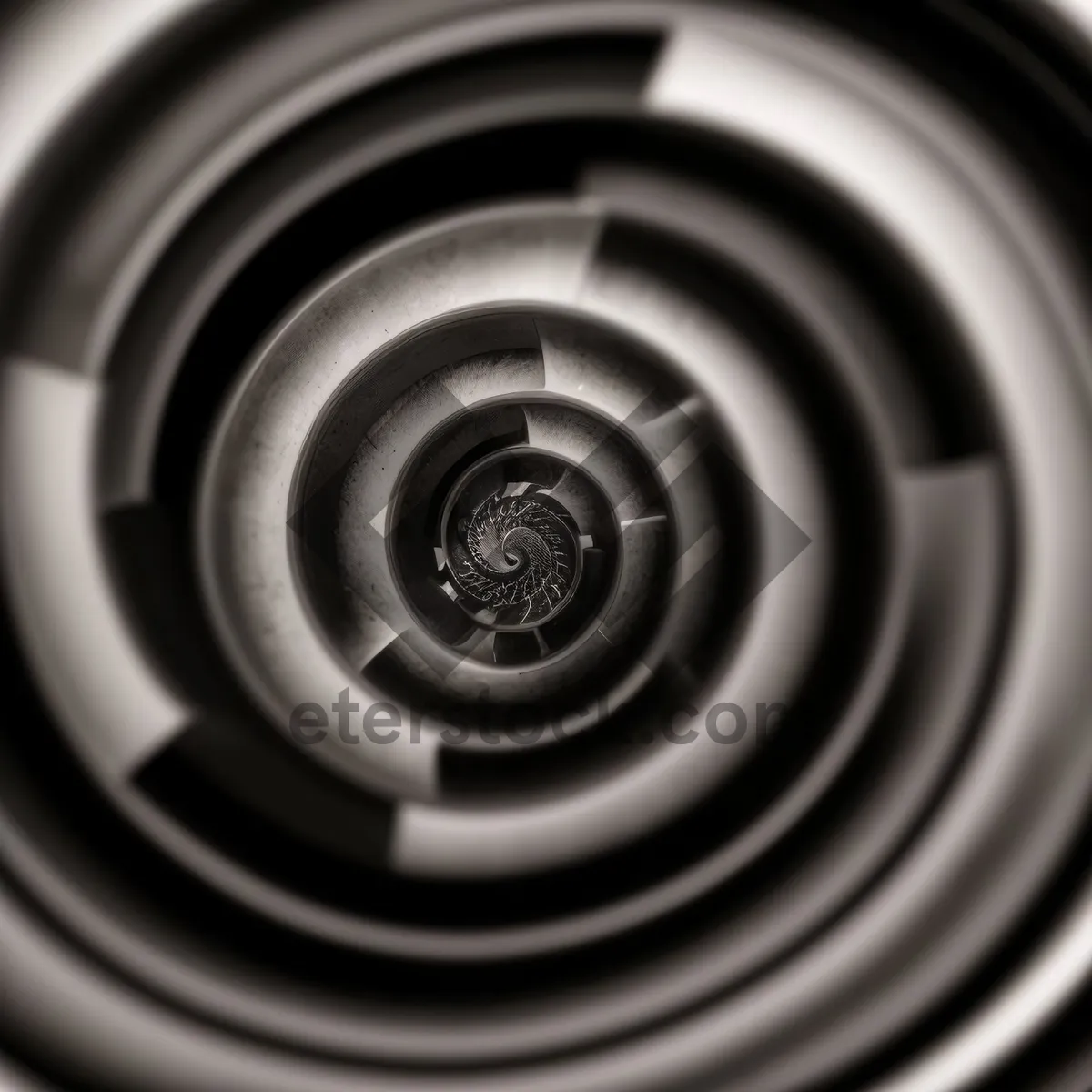 Picture of Coil Spring in Motion Reflecting Liquid