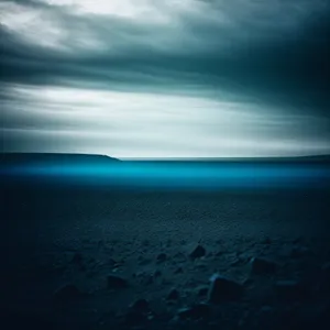 Serene Sunset over Ocean Shoreline