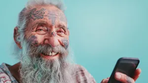 Happy elderly man with gray hair portrait.