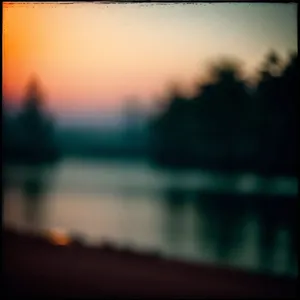 Sundown Reflection: Mirrored Car Shines Under Night Sky