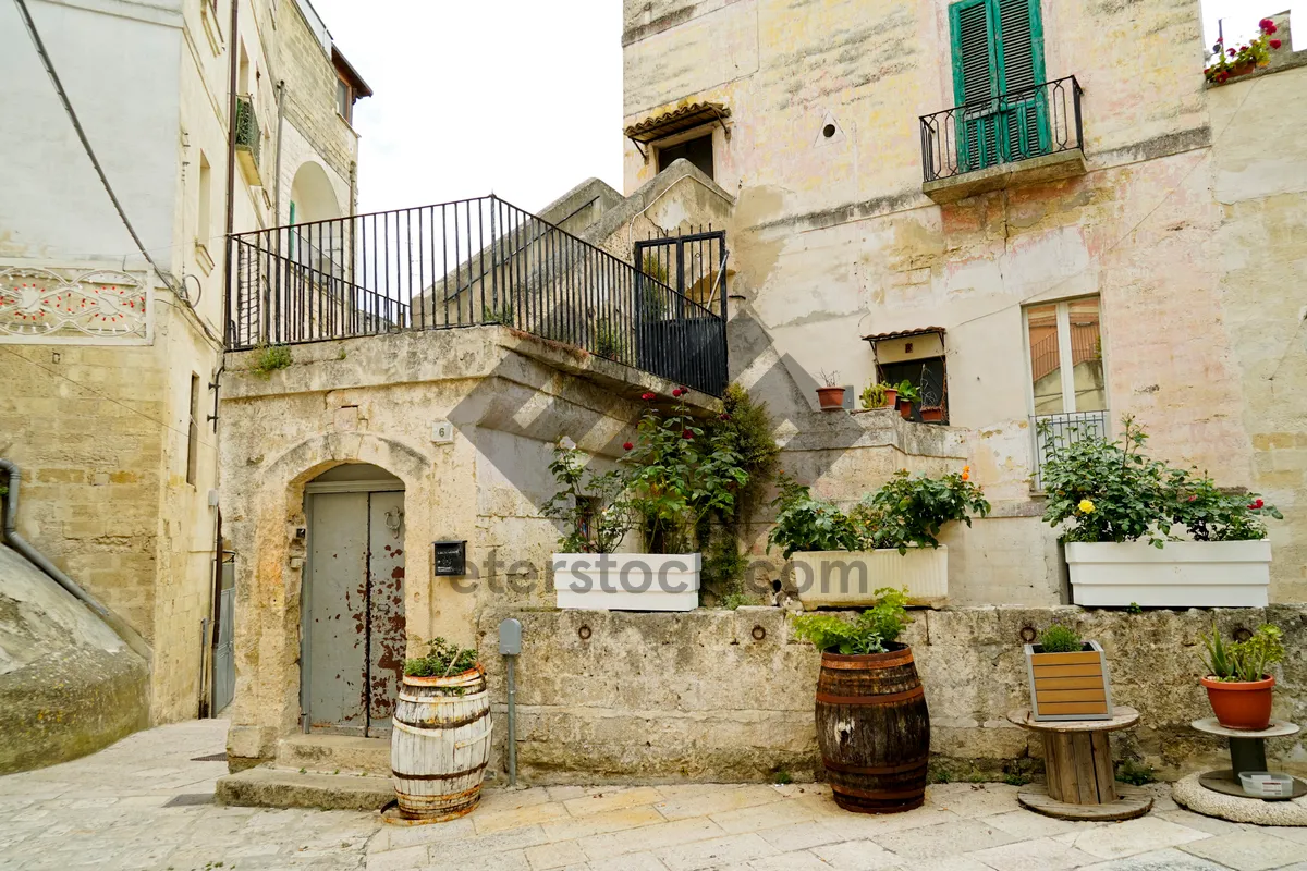 Picture of Historic stone church with ancient balcony and door.