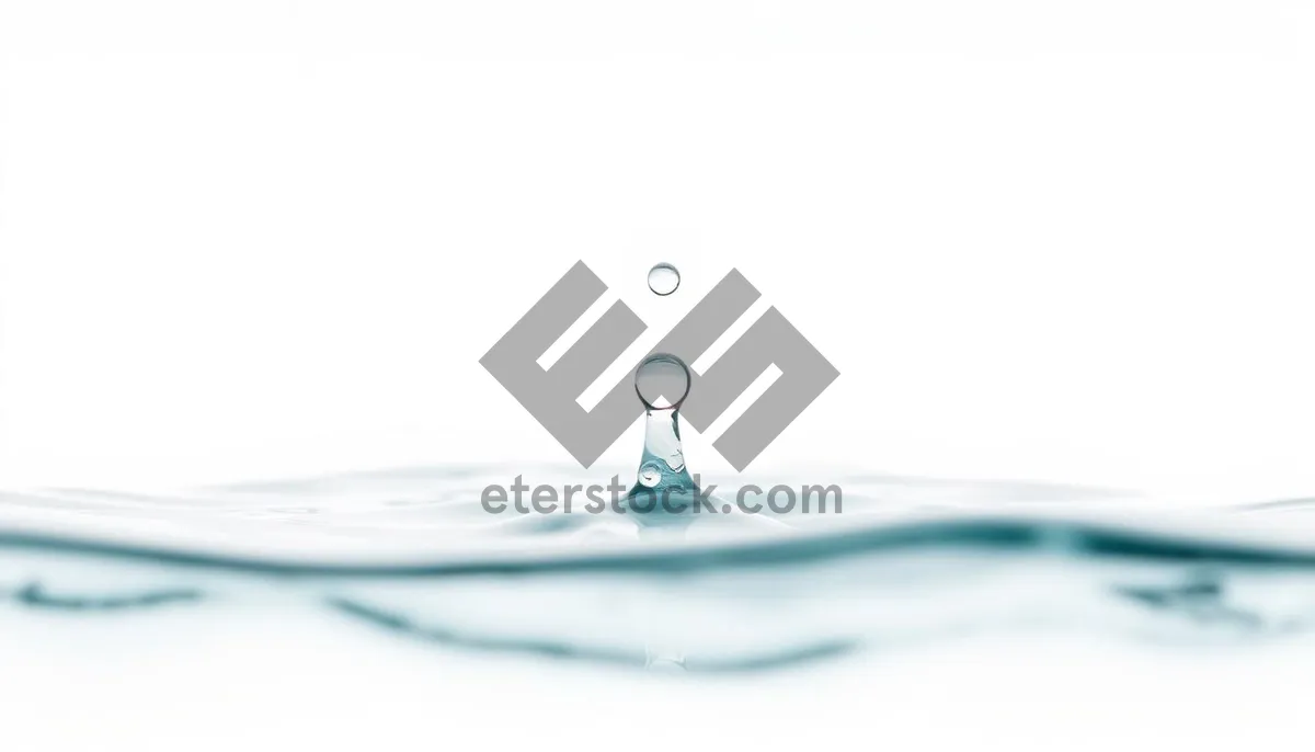 Picture of Clear water splash with bubbles on glass surface