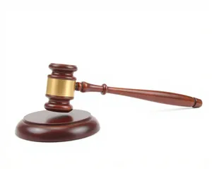 Wooden gavel on court table - legal justice symbol.