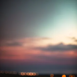 Serene Sunset over Beach Horizon