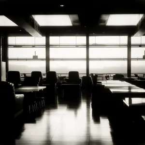 Modern Classroom Interior with Glass Windows and Contemporary Furniture.