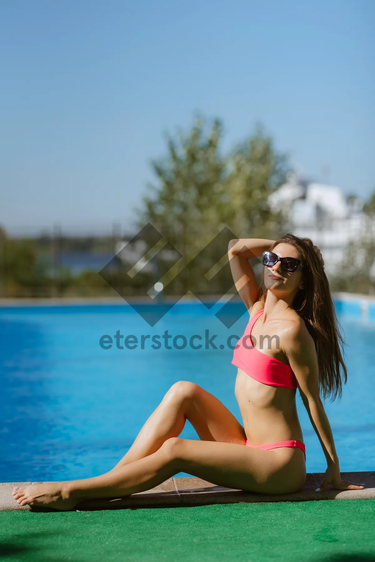 Picture of Sexy model in bikini relaxing on tropical beach