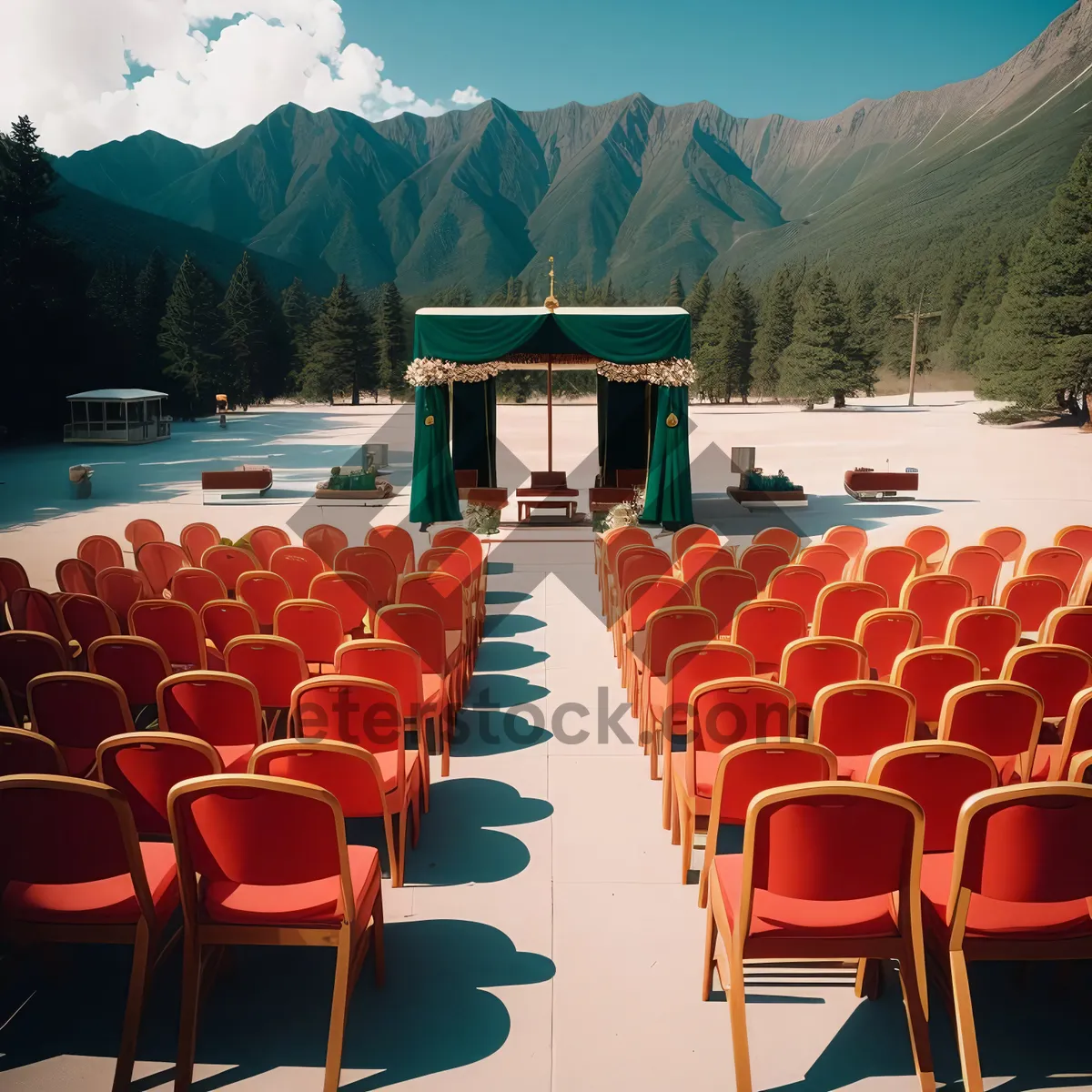 Picture of Empty restaurant interior with folding chairs and tables.