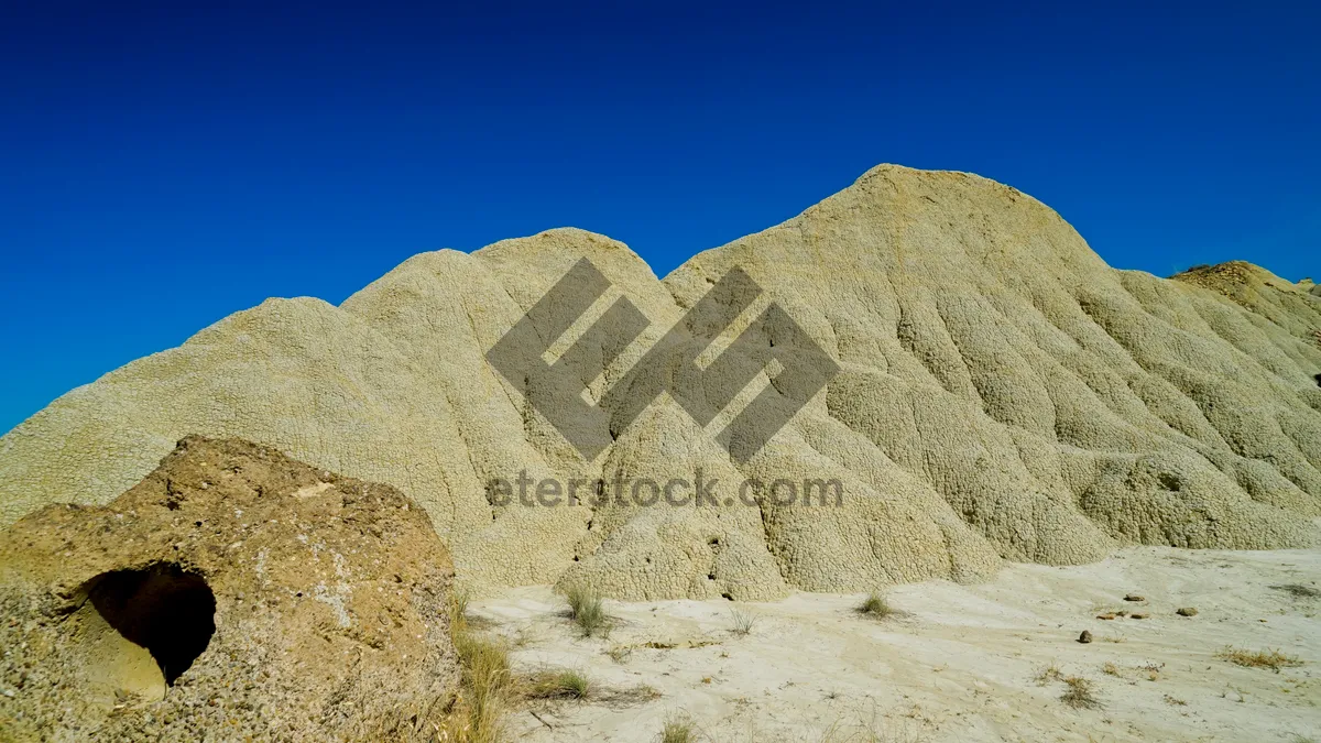 Picture of Scenic desert canyon overlooking panoramic mountain landscape.