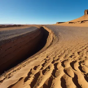 Majestic Dunes Stretching Across Desert Landscape