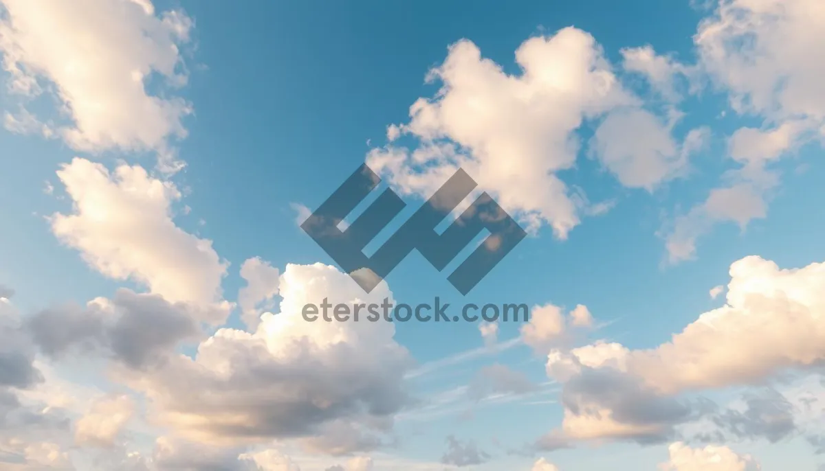 Picture of Vibrant Summer Sky with Fluffy Clouds