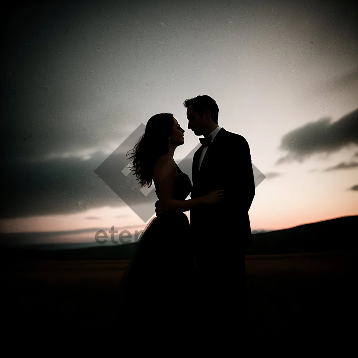 Picture of Romantic Sunset Silhouette of Newlywed Couple