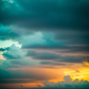 Vibrant Sunset Over Cloud-filled Sky
