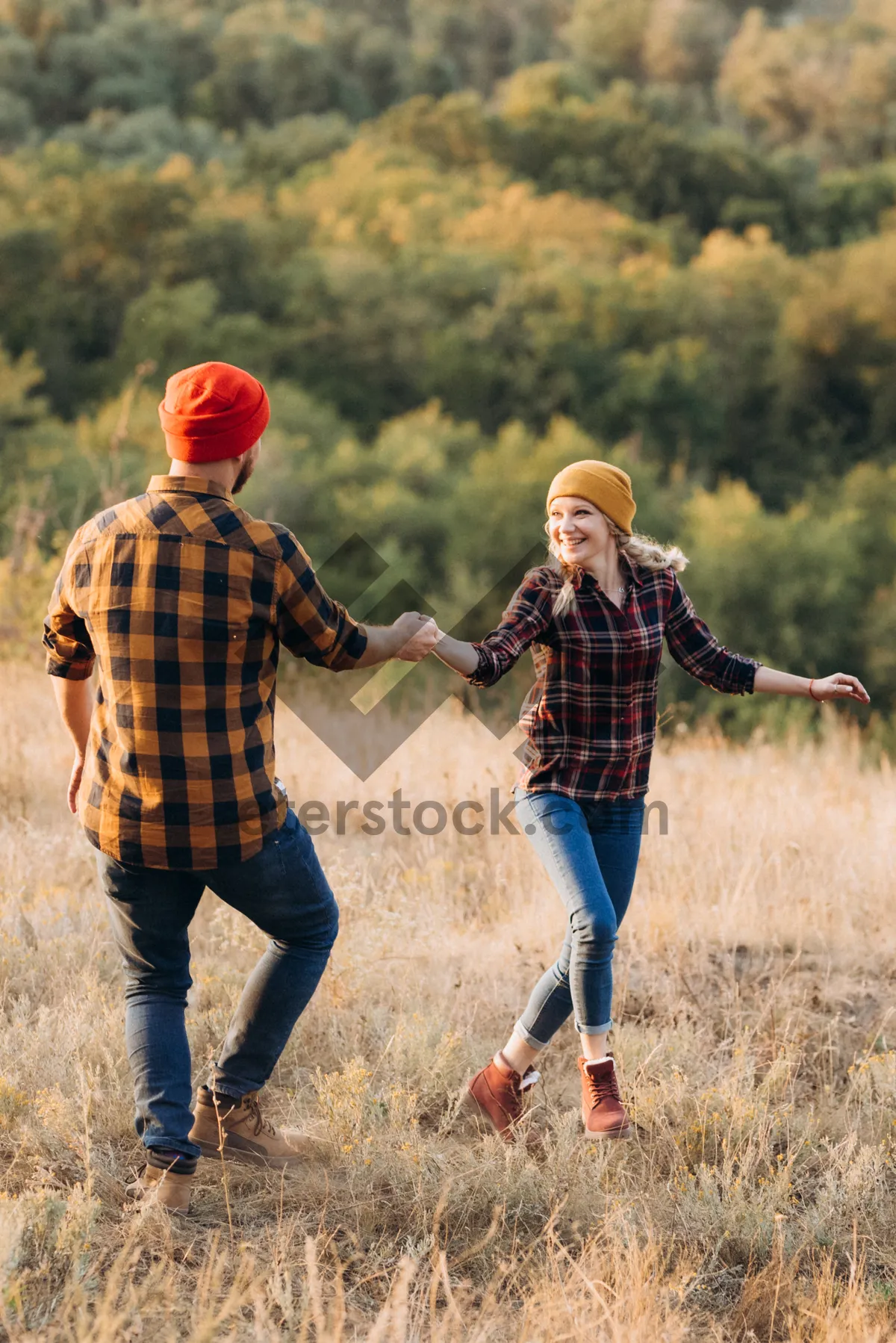 Picture of Happy boy enjoying outdoor hike in summer meadow.