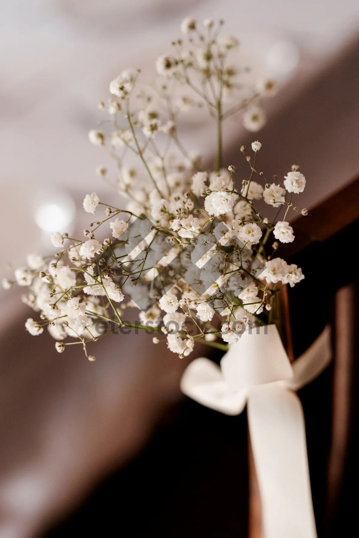 Picture of Spring bridal bouquet with cherry blossoms and spirea branches.