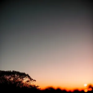 Vibrant Sunset Sky with Clouds and Sun