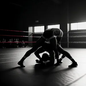 Dynamic Wrestler on Sports Mat