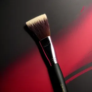 Vibrant Artistic Makeup Brushes in a Palette