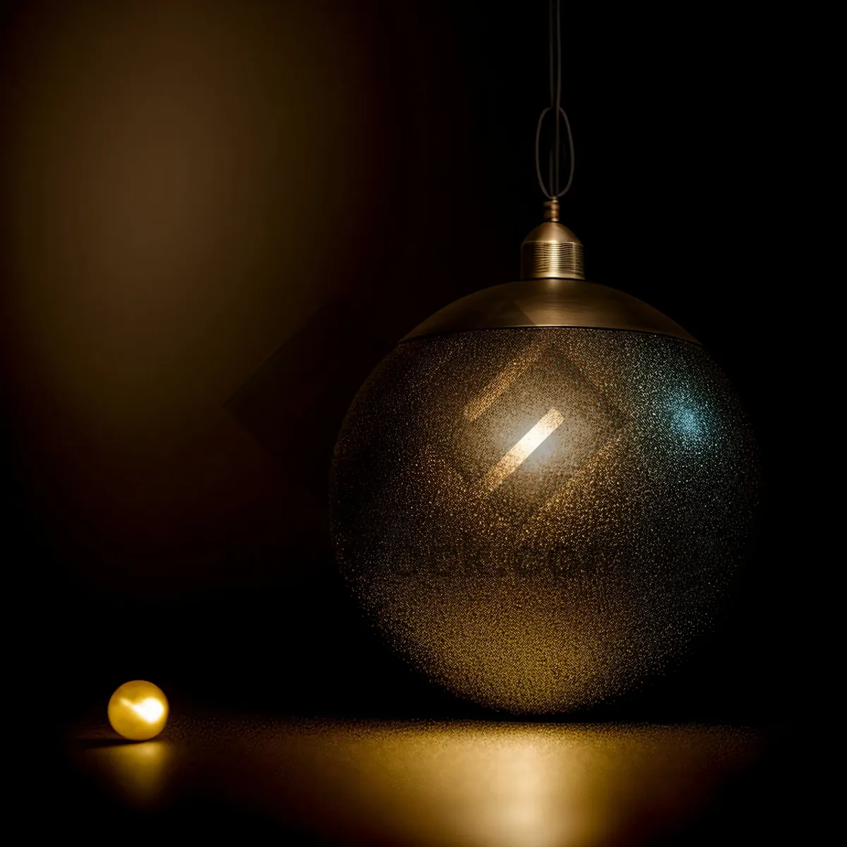 Picture of Festive Gold Bauble Hanging from Tree