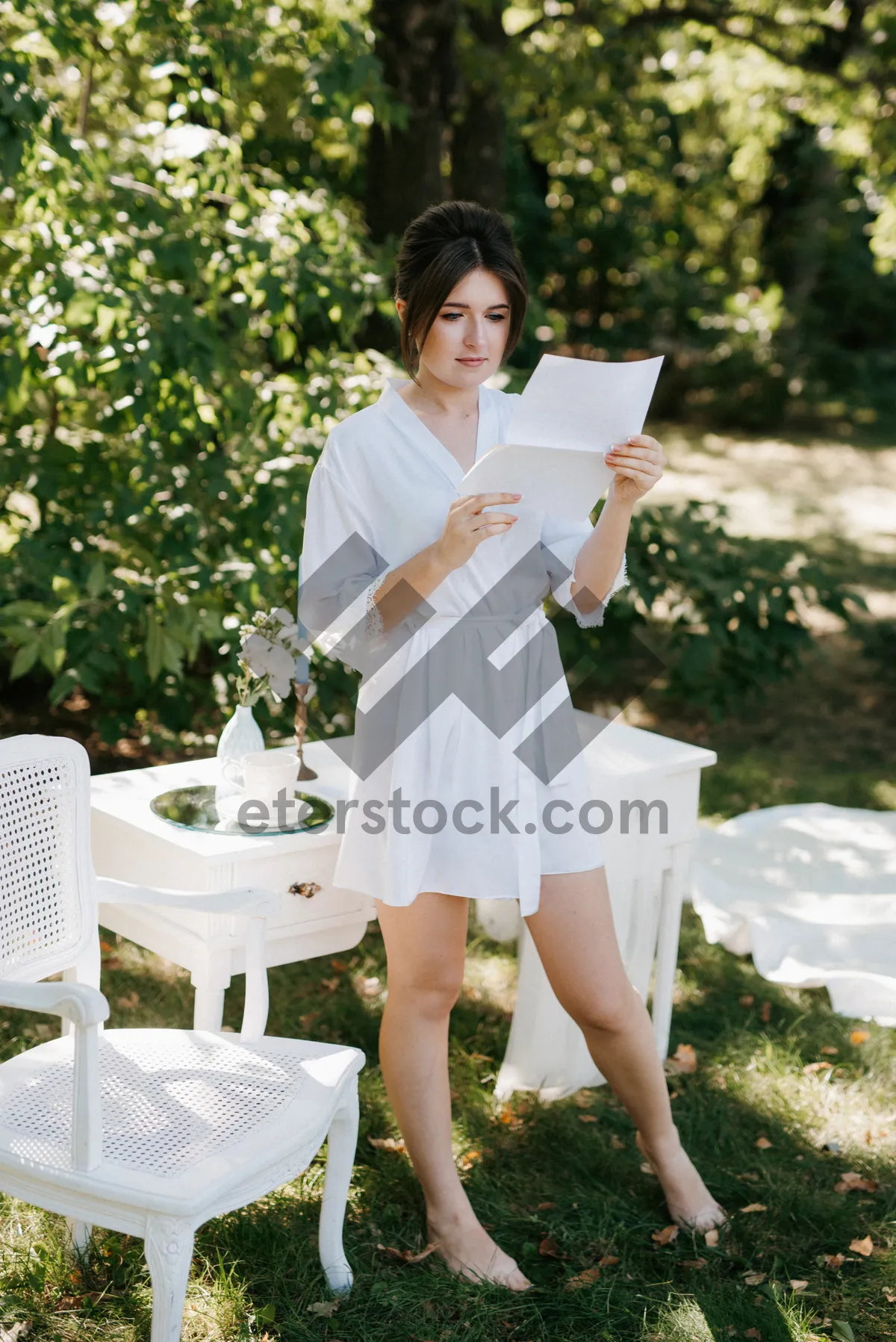 Picture of Happy male waiter in outdoor setting smiling