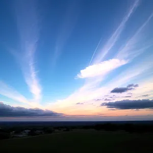 Vibrant Sunset over Rolling Countryside