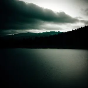 Serenity at Sunset: Reflective Lake, Vibrant Sky