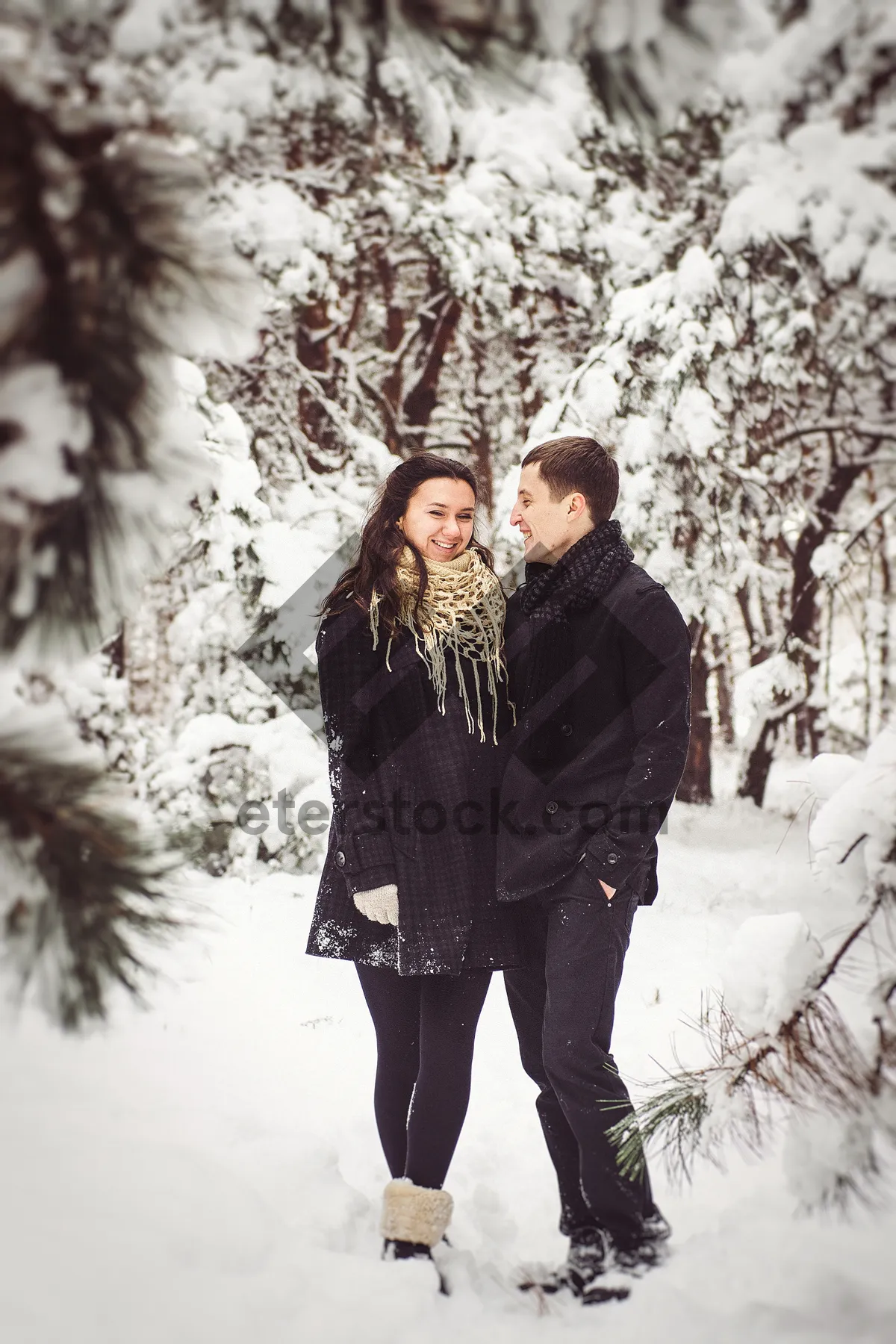 Picture of Happy adult enjoying winter snow in park.