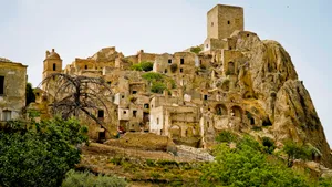 Ancient Stone Fortress Tower in Historic City Skyline