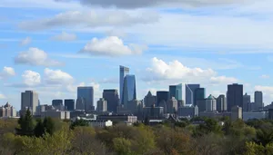 Modern city skyline with river and office buildings