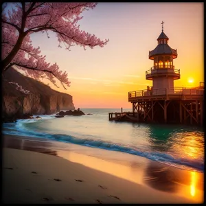 Serenity at Sea: Sunset Reflection on Beach Tower