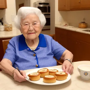 Happy Elderly Couple Enjoying Breakfast Together