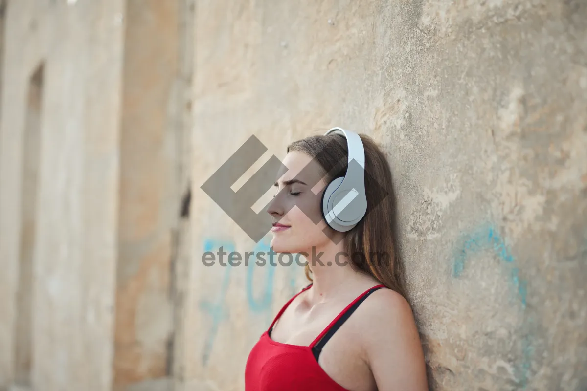 Picture of Fashion model with attractive makeup and brunette hair.