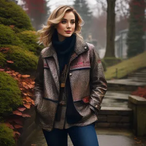 Smiling brunette model in fashionable sweater