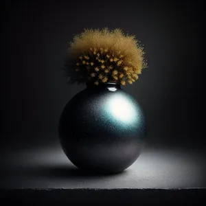 Shimmering Winter Bauble: Sparkling Black Glass Ball for Seasonal Celebration