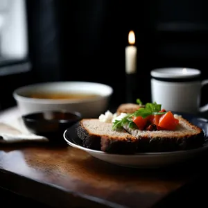 Gourmet breakfast meal on restaurant table with coffee.