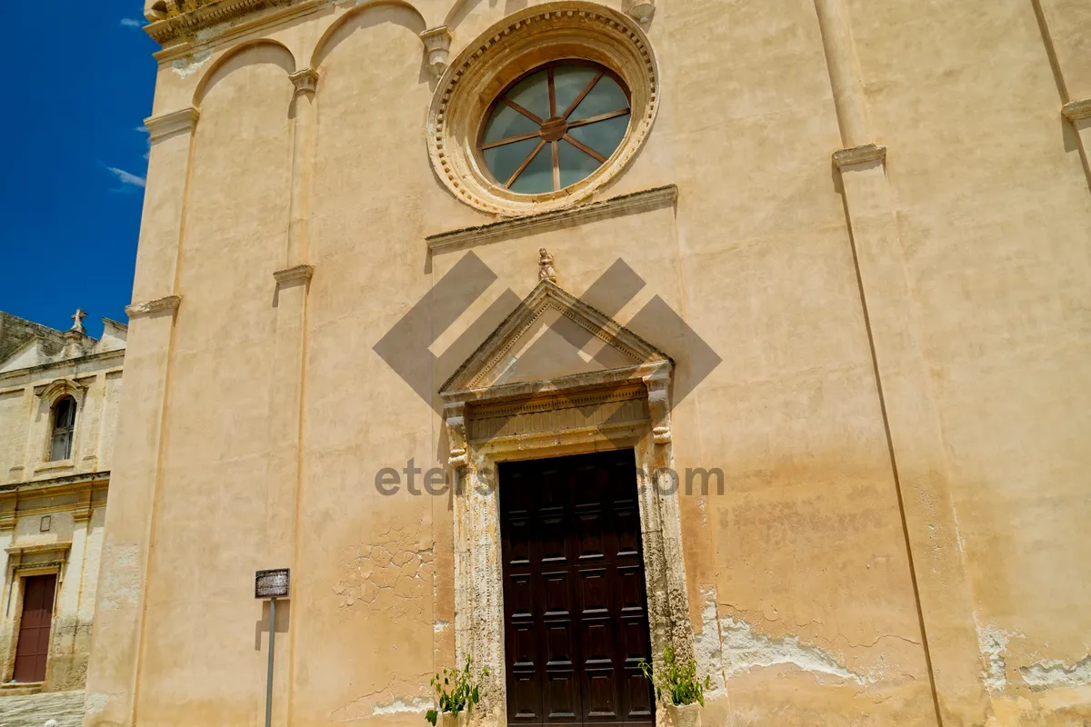 Picture of Medieval church entrance with stone arch